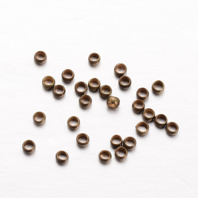 Perles à écraser 2mm Bronze (x1gr) Perles à écraser 2mm Bronze (x1gr)