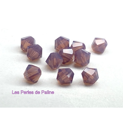Toupies 4mm Cyclamen opal - réf. 5328 Xilion (x20) Toupies 4mm Cyclamen opal - réf. 5328 Xilion (x20)